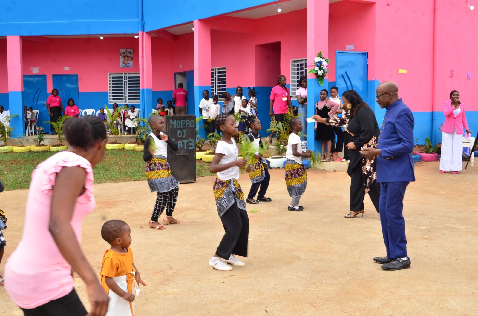 Pupils performing a traditional dance during a school event