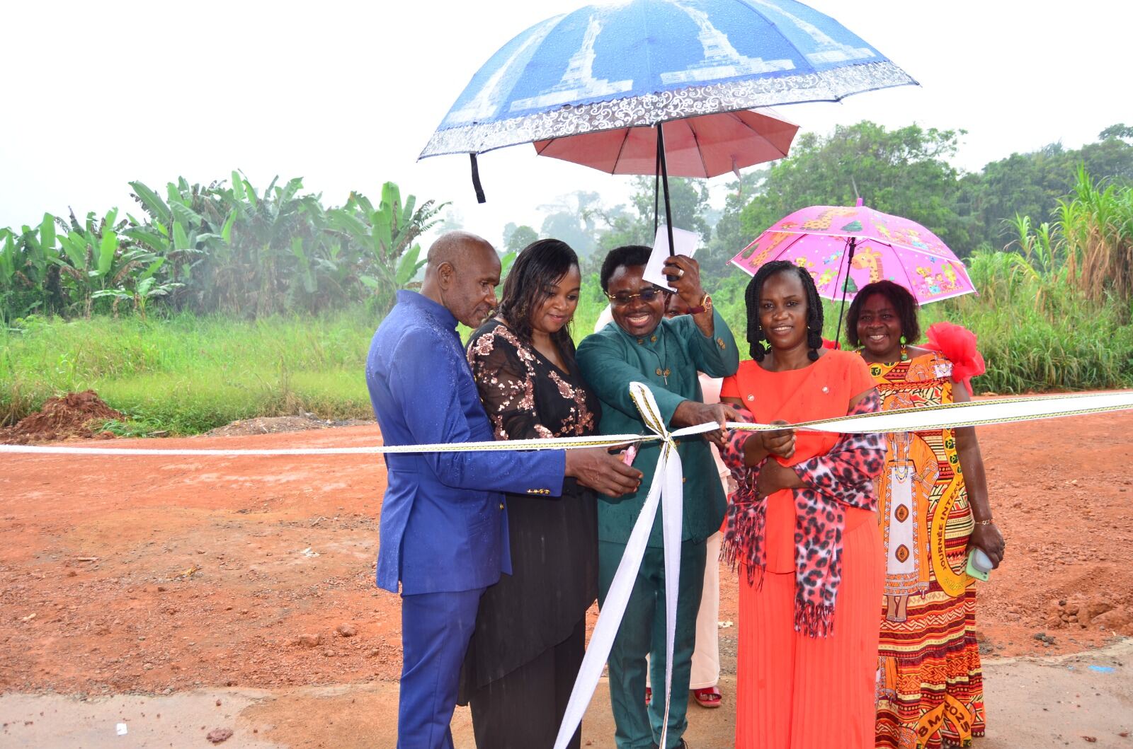 Ribbon-cutting ceremony in the rain