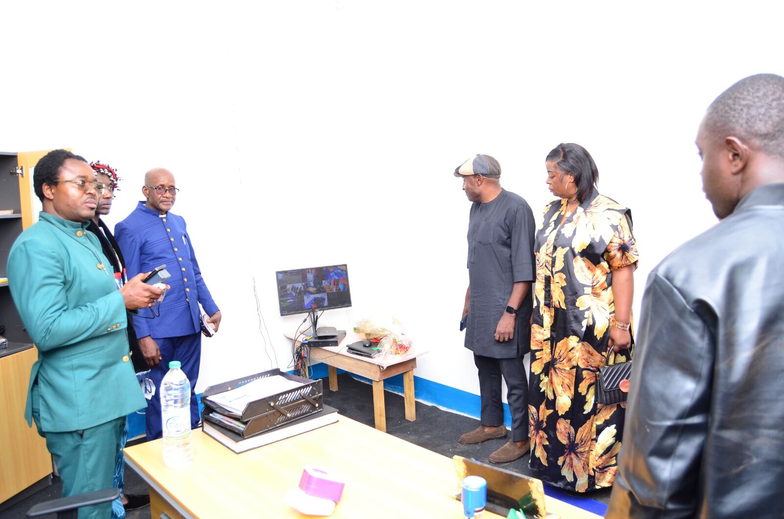 Staff reviewing the campus security monitoring room